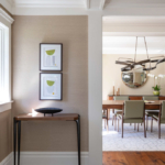 Side table with clean lines, artwork, and modern dining room