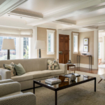 Modern living room sofa, chairs, coffee table, lights